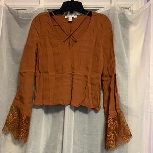 Cris-cross and lace crop top